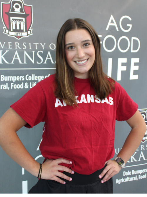 Image of Kyla wearing Razorback red